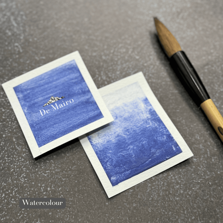 Genuine Lapis Lazuli Indigo Shade Pigment watercolour swatches alongside a paintbrush