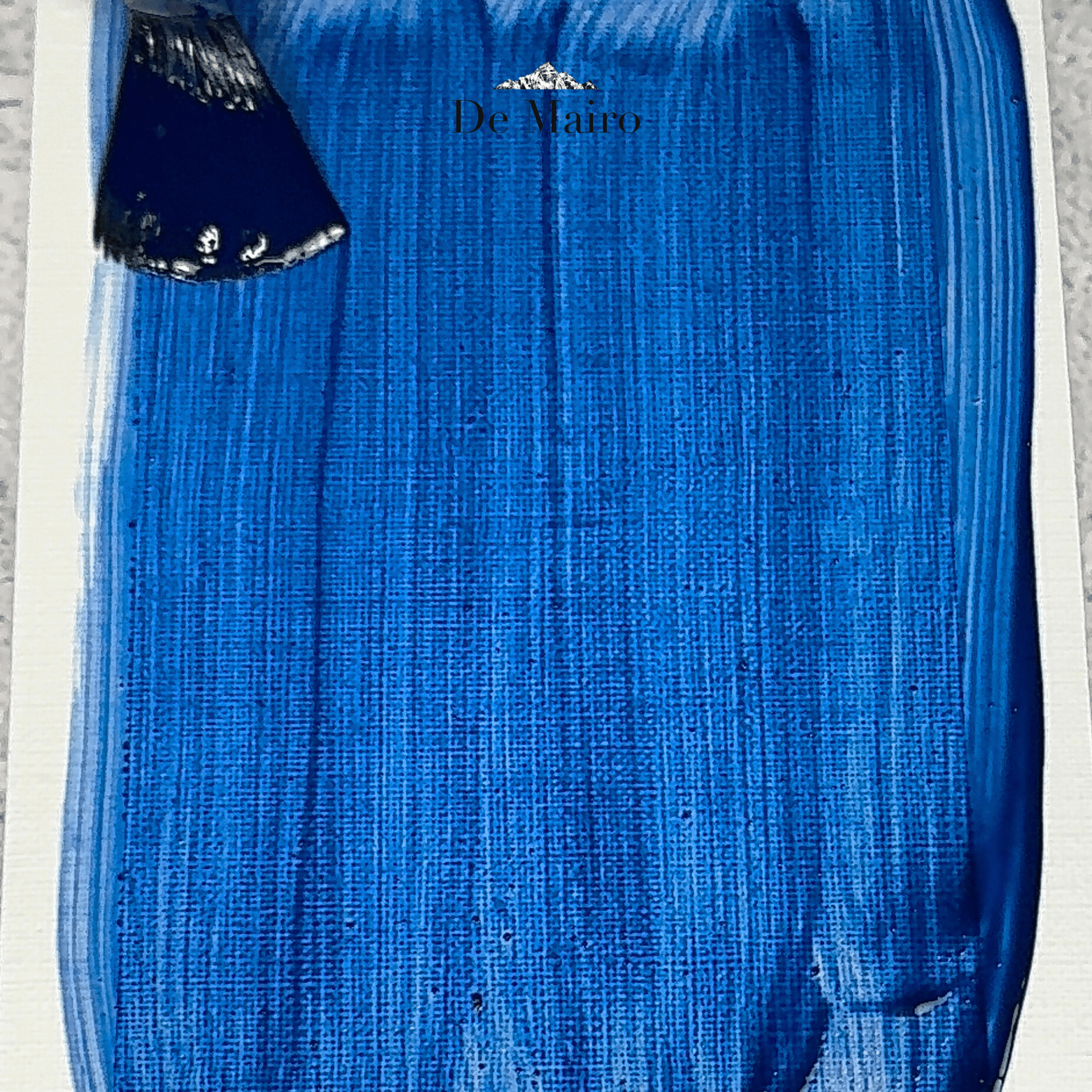 A Radiant Lapis Lazuli Ultramarine Azure Shade Pigment oil swatch with a paintbrush