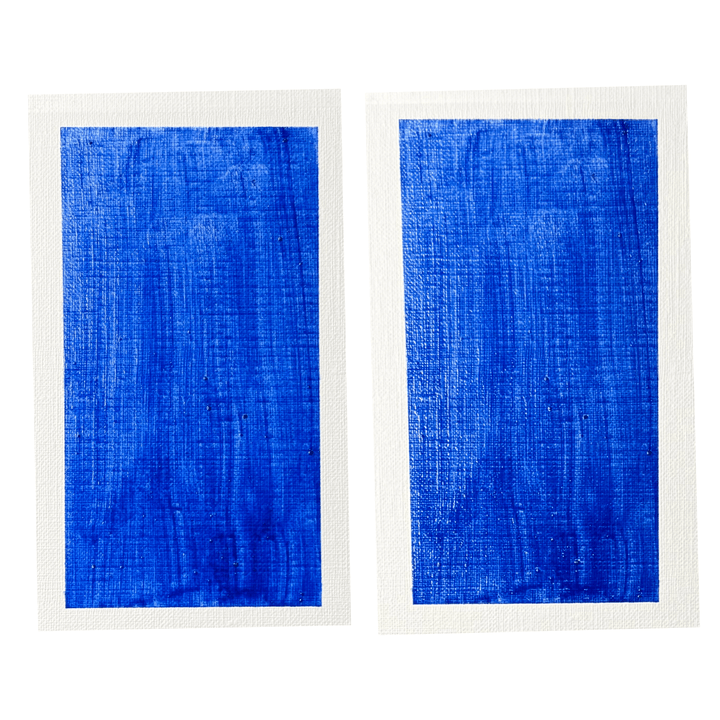 Two hand-painted swatches of Fra Angelico lapis lazuli showing its soft, luminous sky-blue tone