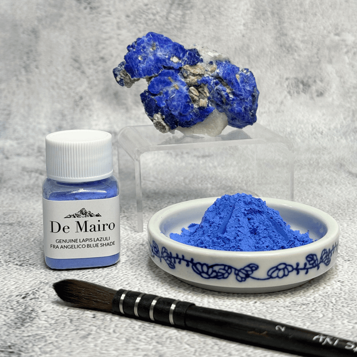 De Mairo Fra Angelico pigment jar topped with raw Afghan lapis lazuli, with a dish of blue pigment and a paintbrush