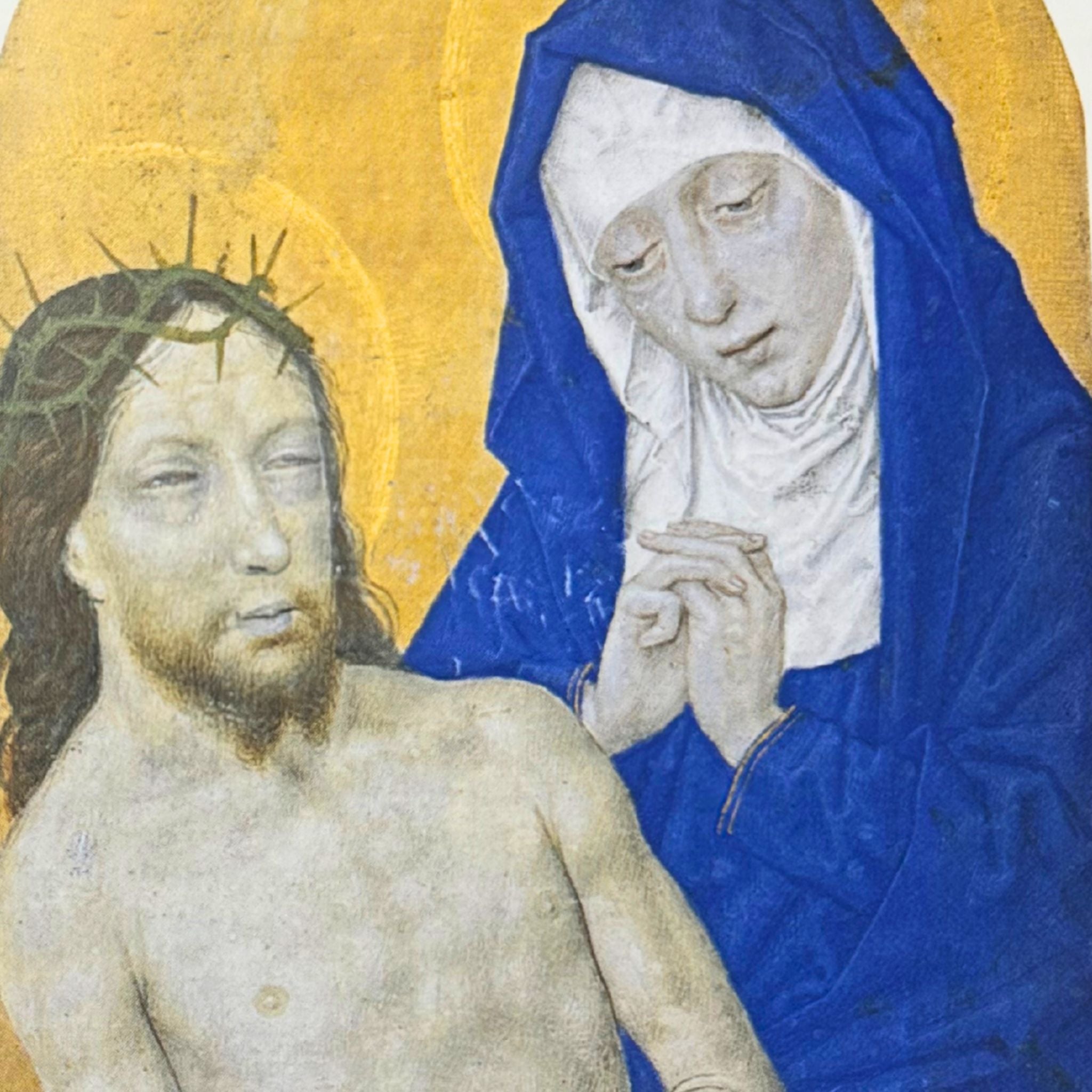 Artistic depiction of a religious scene with Mary in blue robes and Jesus with a crown of thorns against a yellow background.