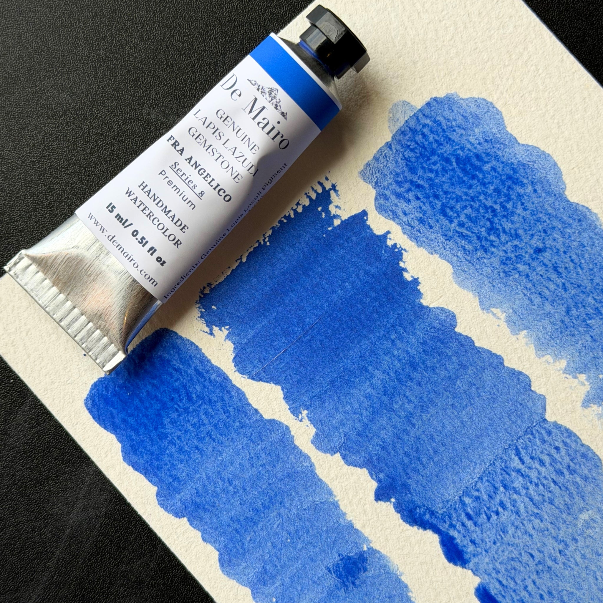 Premium lapis lazuli watercolour paint showing Fra Angelico blue shade